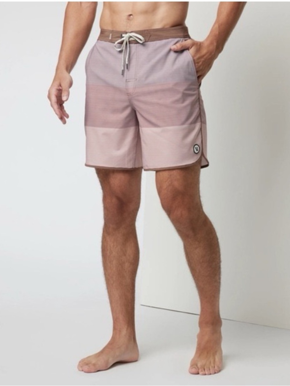 Vuori men's colorblock boardshorts in dusty rose and blush